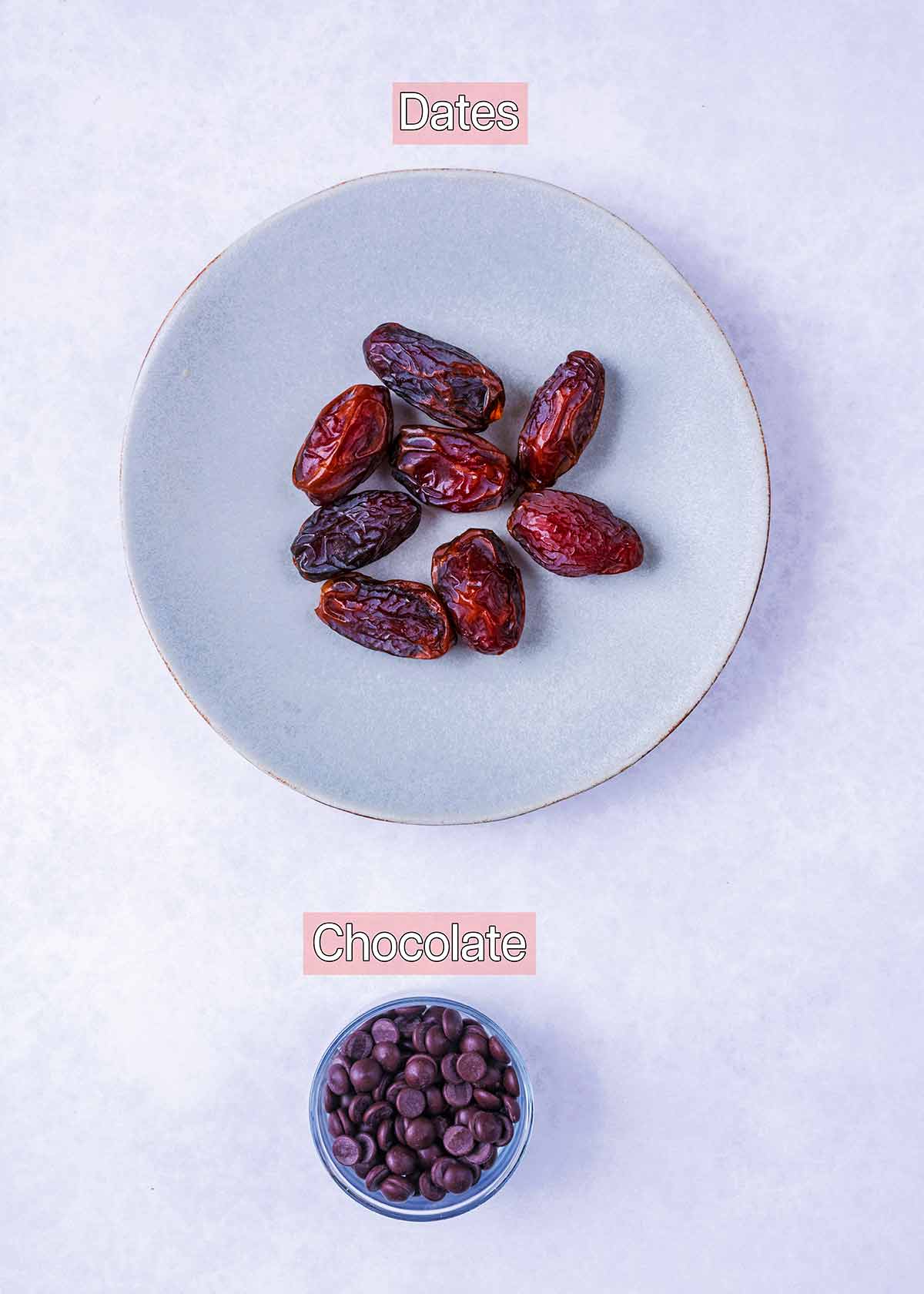 A plate of dates and a small bowl of chocolate chips, both are labelled.