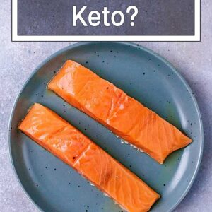 A plate of salmon fillets with a text overlay saying Is Salmon Keto?